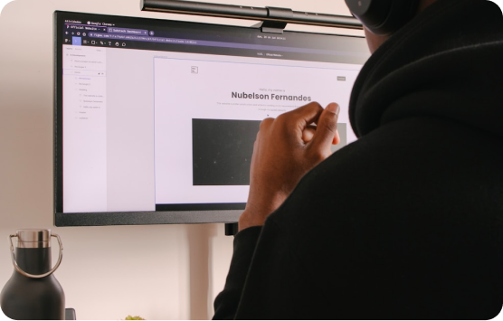 A webflow expert, working on figma where hes designing a client website.