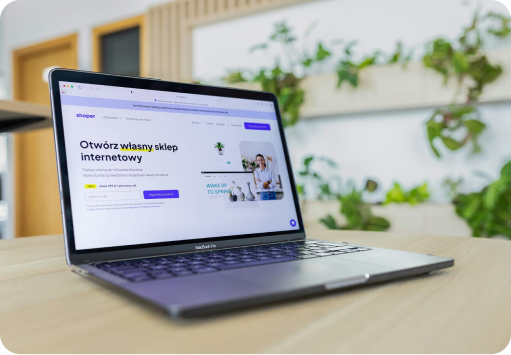 A laptop with a preloaded website on the screen.